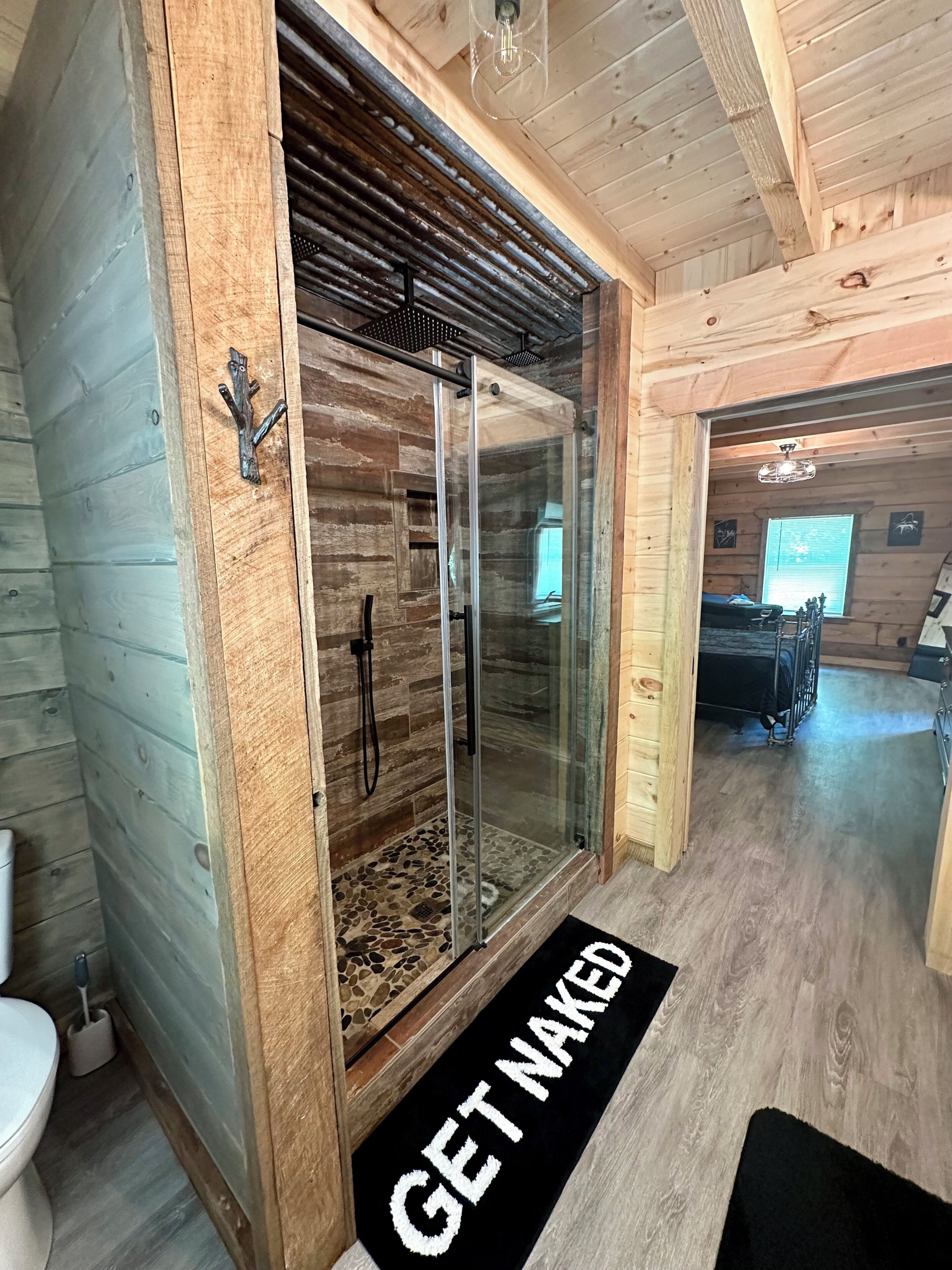Shower, hair dryer, towels, toilet paper