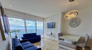 Deluxe Apartment, Balcony, Sea View | Living area