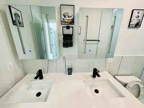 Shower, hair dryer, towels