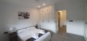4 bedrooms, iron/ironing board, travel cot, WiFi