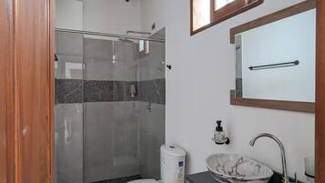 Shower, towels, soap, toilet paper