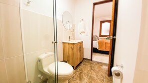 Shower, towels, soap, toilet paper