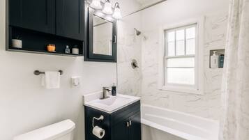 Hair dryer, towels, soap, shampoo