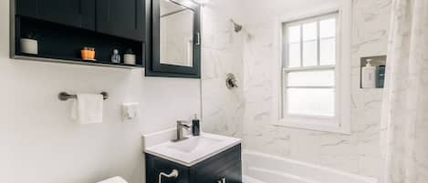 Hair dryer, towels, soap, shampoo