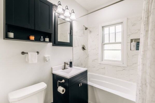 Hair dryer, towels, soap, shampoo