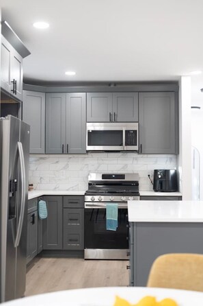 Fridge, microwave, oven, stovetop - Urban Contemporary Loft Retreat (Providence)