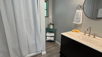 Hair dryer, towels, soap, shampoo