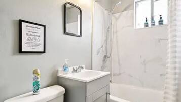 Hair dryer, towels, soap, shampoo