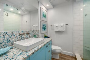 Shower, hair dryer, towels, soap