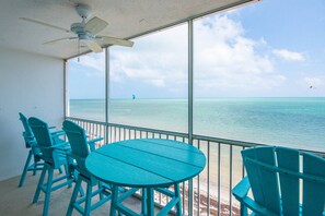 Outdoor dining - All Aboard: 2BR Oceanfront Condo with Community Pool, Tiki Hut, and Stunning Views of the Atlantic! (Marathon)