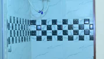 Shower, rainfall showerhead, towels, soap