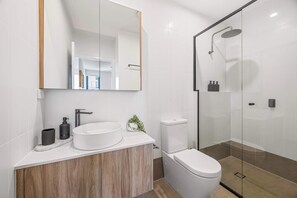 Shower, hair dryer, towels, soap