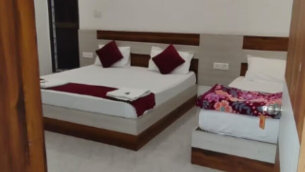 Deluxe Triple Room, City View | Kalis bunyi, Wi-fi percuma, cadar katil