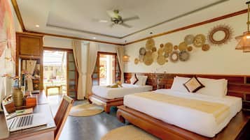 Habitación triple Deluxe, balcón, vistas al jardín | Fachada del alojamiento