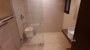 Shower, rainfall showerhead, towels, soap