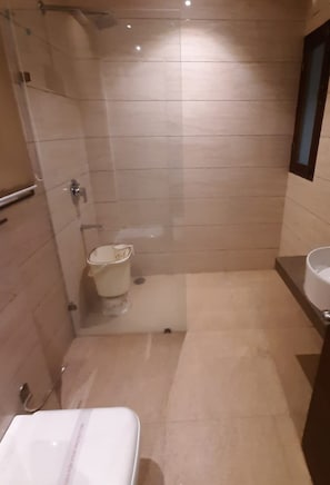 Shower, rainfall showerhead, towels, soap