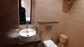Shower, rainfall showerhead, towels, soap