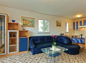 House (Two Bedroom Holiday Home with Sea Vie) | Living room | 32-inch flat-screen TV with satellite channels - Holiday Home Brsec (Moscenicka Draga)