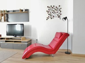 Apartment (One Bedroom Apartment) | Living room | 32-inch flat-screen TV with digital channels - Stylish Rijeka City Center Apartment (Rijeka)