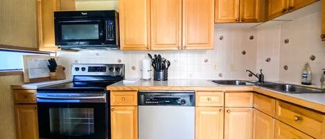 Microwave, oven, coffee/tea maker, cookware/dishes/utensils