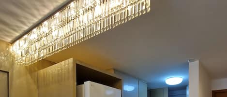 Exclusive Apartment | Private kitchen | Full-sized fridge, microwave, cookware/dishes/utensils, dining tables