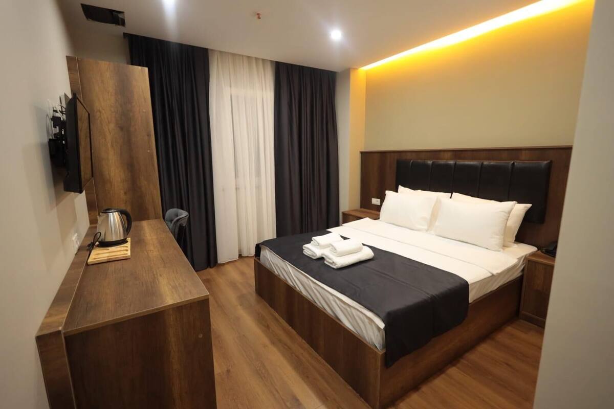 Premium bedding, desk, laptop workspace, WiFi (free)