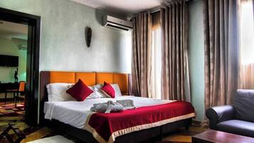 Deluxe Room, Balcony, City View | Desk, laptop workspace, free WiFi