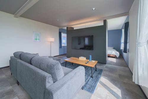 Comfort House, Sea View | Living area | 65-inch flat-screen TV with digital channels, Netflix, Hulu
