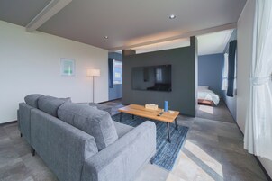 Comfort House, Sea View | Living area | 65-inch flat-screen TV with digital channels, Netflix, Hulu