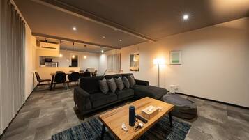 Comfort House, Sea View | Living area | 65-inch flat-screen TV with digital channels, Netflix, Hulu