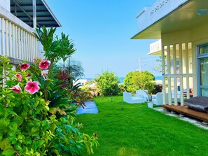 Terrace/patio - Charming 3-bedroom house with AC and WiFi in serene Okinawa (nakagami)