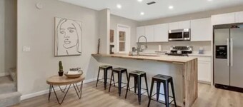 Beach side family friendly Happy Home, steps from no drive beach.