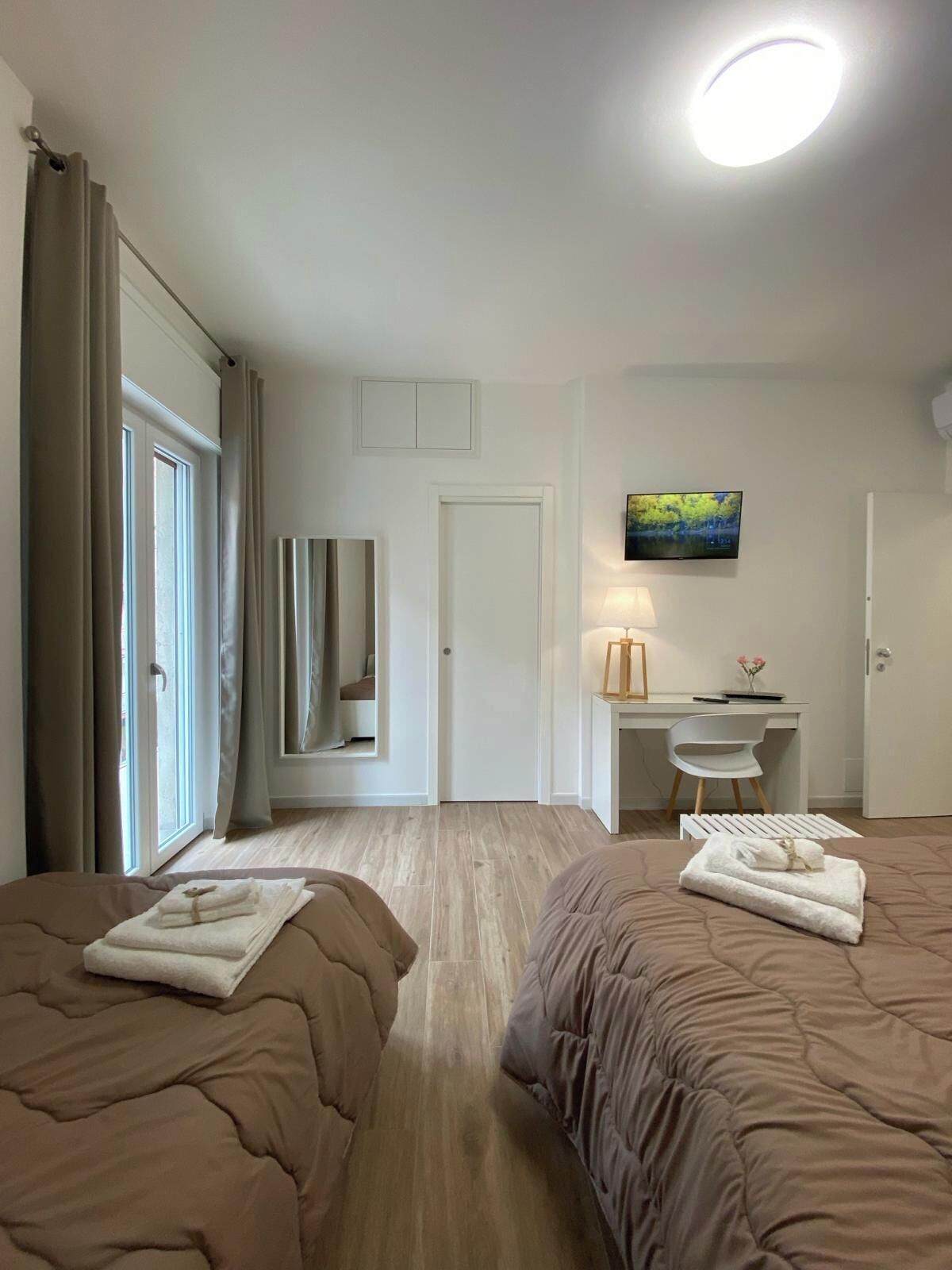 Desk, laptop workspace, blackout drapes, soundproofing