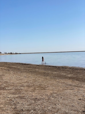 Espreguiçadeiras, toalhas de praia