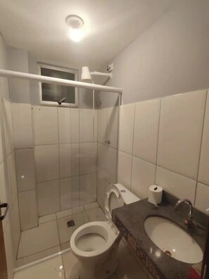 Shower, towels, soap, toilet paper