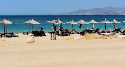 Charming Greek Apartment – Relax on the Rooftop with Sea View, 60m to the beach