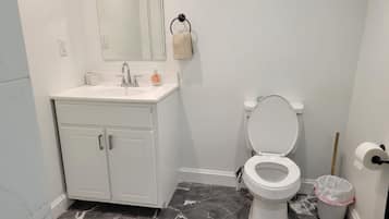 Shower, towels, soap, shampoo