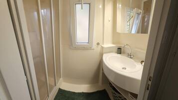 Douche, sèche-cheveux