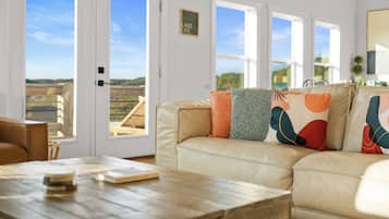 Smart TV, fireplace, table football, books