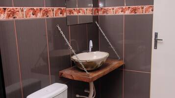 Bidet, towels, soap, shampoo