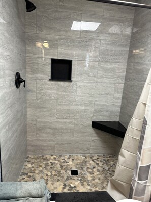 Shower, towels, toilet paper