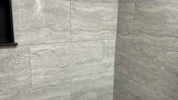 Shower, towels, toilet paper