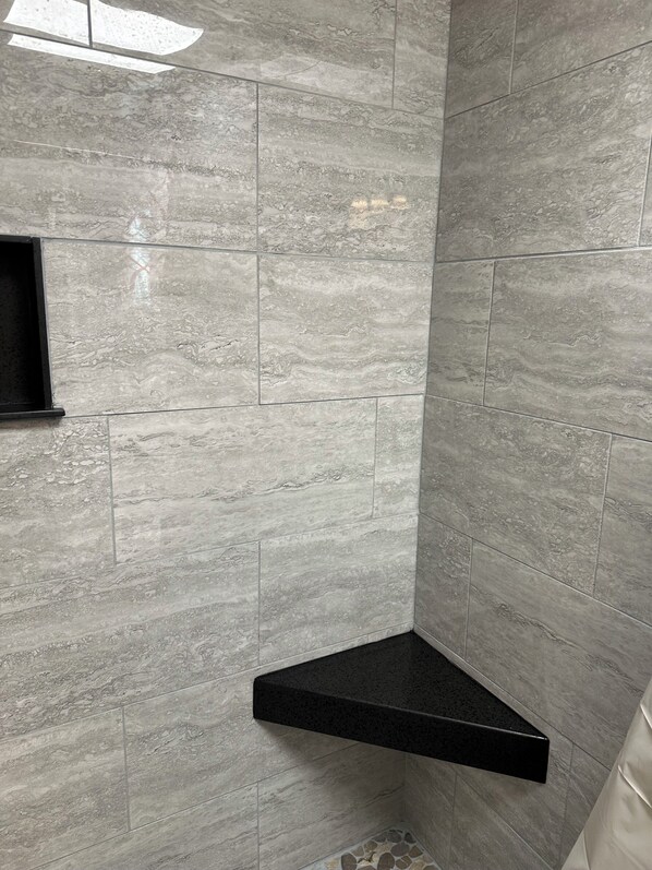 Shower, towels, toilet paper