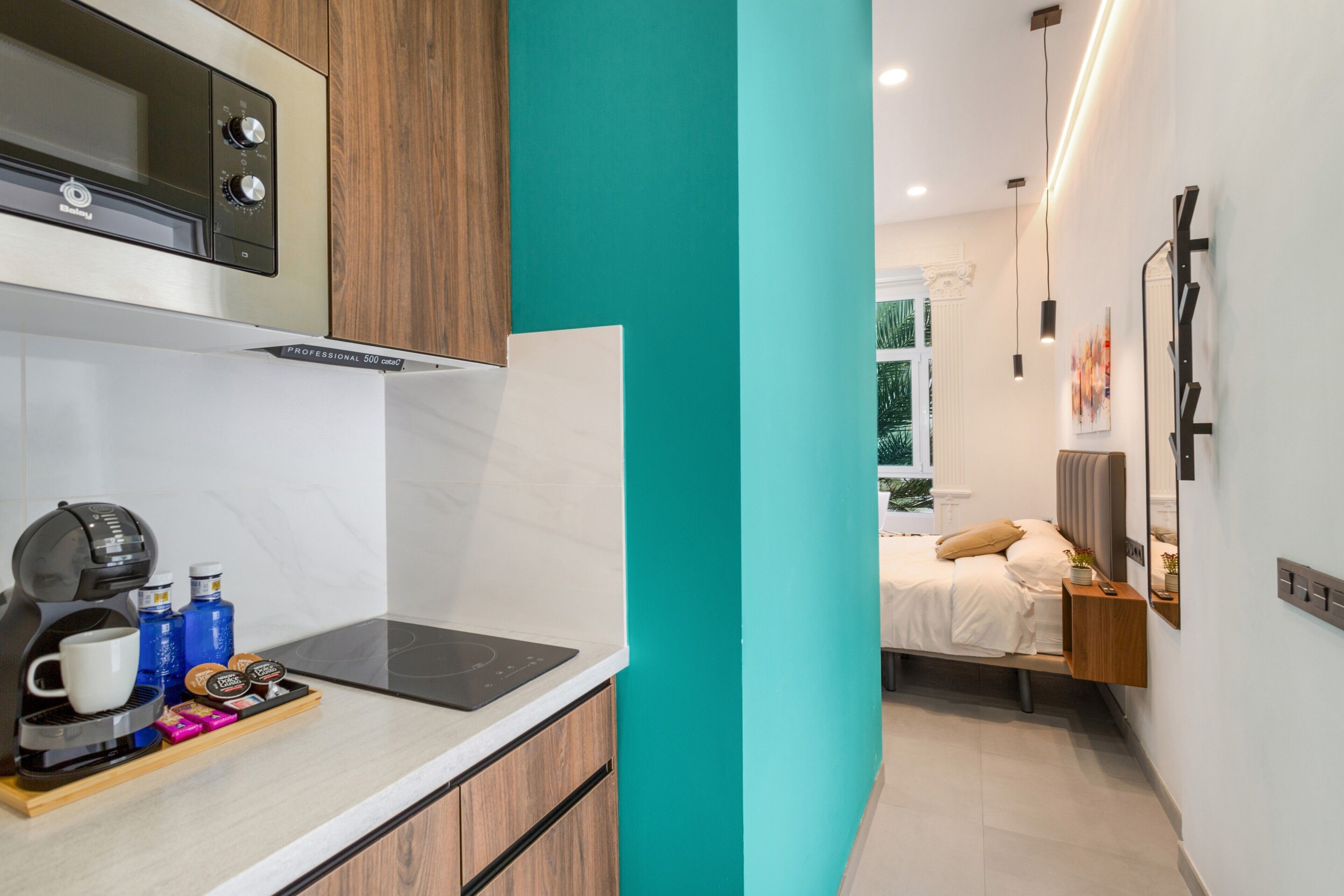 Fridge, microwave, stovetop, coffee/tea maker