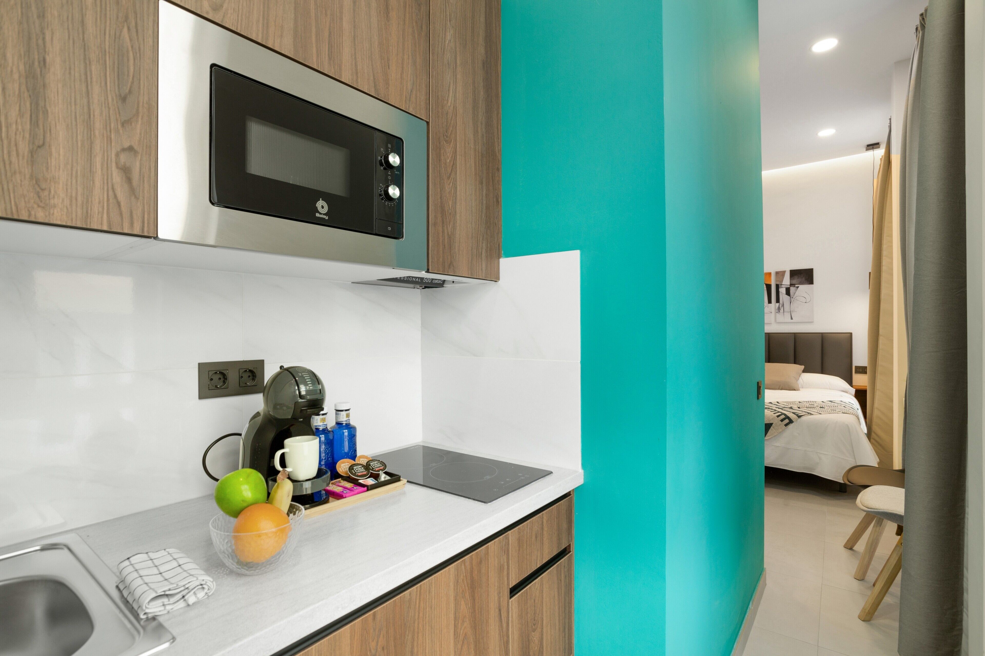 Fridge, microwave, stovetop, coffee/tea maker