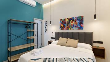 1 habitación, tabla de planchar con plancha, wifi gratis y ropa de cama