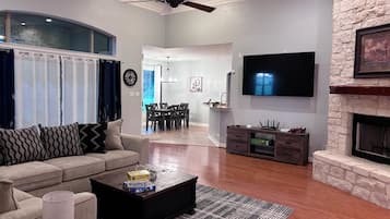 Smart TV, fireplace, video games, foosball