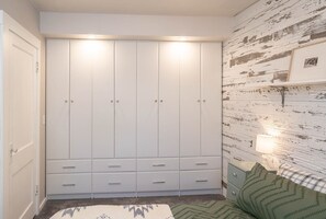 2 quartos, berço de viagem, Wi-Fi de cortesia, roupa de cama