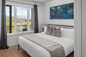 1 bedroom, desk, iron/ironing board, travel crib