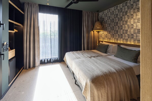 Suite Famille Horizon | Caja de seguridad en la habitación, cortinas blackout y wifi gratis 